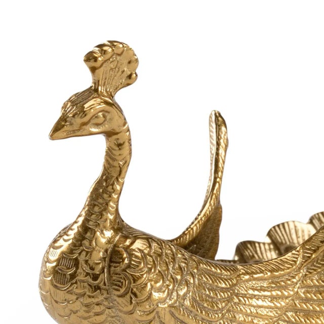 Elevate the elegance in your home or office interior with this decorative peacock dish. Crafted in aluminum with an...