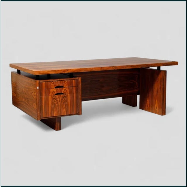 This desk was manufactured in Denmark in the late 1960s and early 1970s. It's very solid and heavy. It looks amazing....