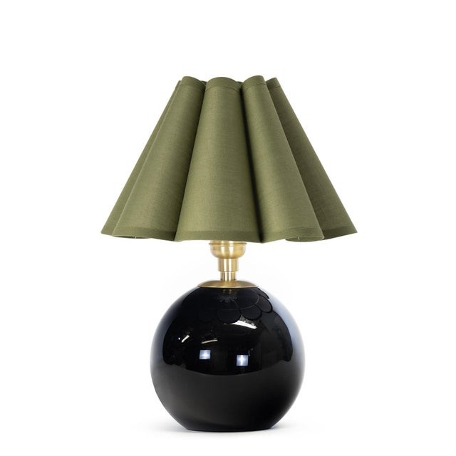 Compact yet striking, the Giorgio Mini Table Lamp is anchored by hand-blown black glass. Designed for versatility, it...