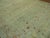 Stunning oversize antique Persian Mohajeran Sarouk rug consisting of a pale wheat ground and powder blue border, some...