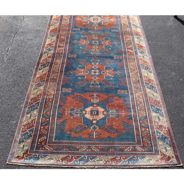 Antique Persian Kurdish Gallery Rug With Blue Field and Bold Geometric Medallion For Sale - Image 9 of 13