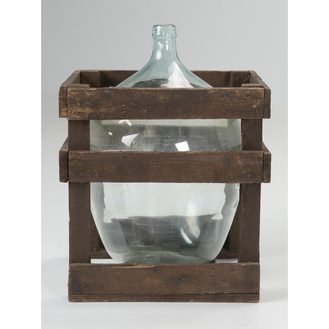 Call it a carboy, demijohn or jimmyjohn, they all are the same, meaning a glass vessel. Carboy's originate from Persia...