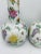 Such a beautiful pair of ceramic chinoiserie vases! White with lovely colors, this is one of the prettiest pairs we have...