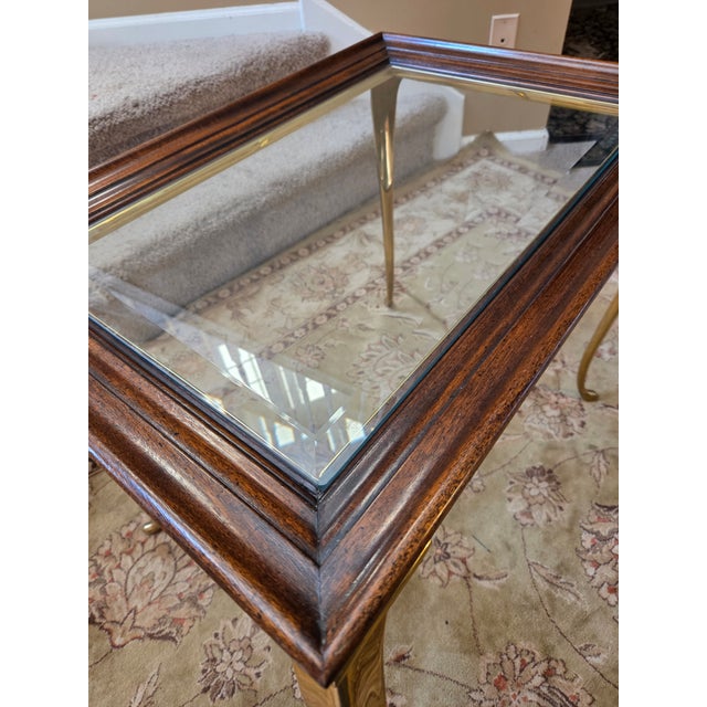 Brandt Furniture Cabrio leg Hollywood Regency beveled glass top table. Cabrio legs are beautifully styled in brass.