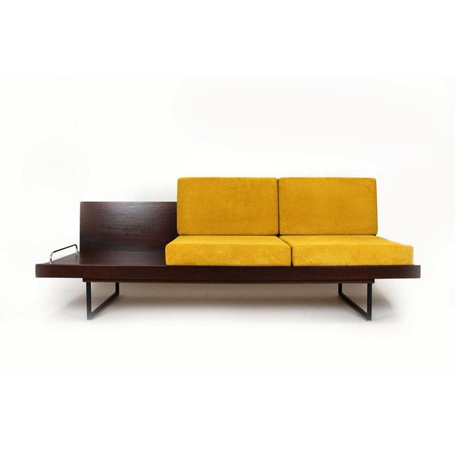 Modular sofa manufactured by Interier Praha in Czechoslovakia during the 1960s–1970s. The piece features a mahogany...