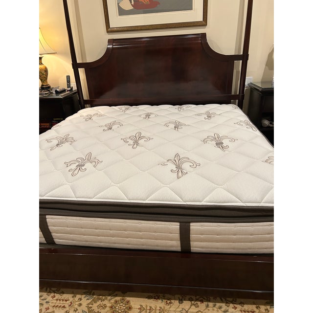 Exceptional traditional solid mahogany wood two poster bed designed by Thomas Pheasant for Baker Furniture. Posts measure...