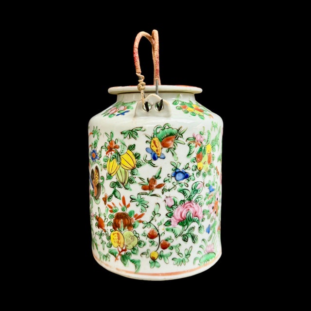 Discover the timeless beauty of this antique Chinese Famille Rose teapot, a remarkable piece originating from 17th-century...