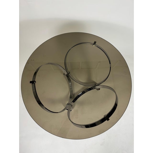 A sculptural mid-century coffee table by Knut Hesterberg from the 1970s. Its defining features are the chrome-plated steel...