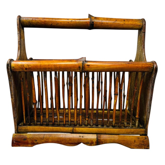 Add a touch of bohemian and Mid-Century Modern (MCM) charm to your home with this unique vintage magazine rack from the...