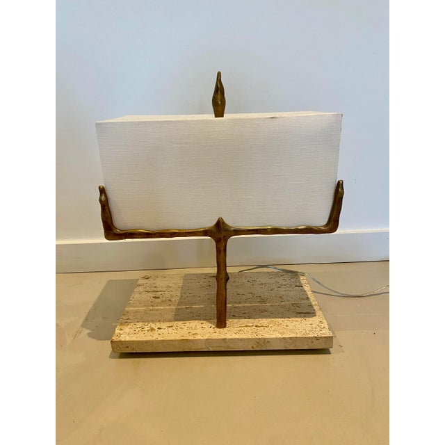 These are WOW! Global Views Ghent Table Lamps are made of heavy cast bronze with a natural travertine base. These are...