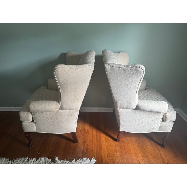 Pair of Vintage Pennsylvania Townhouse Wingback Chairs in Beige Damask Elevate your living space with this exceptional...