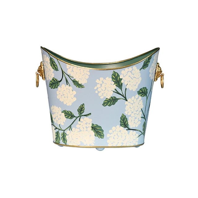 New item. Not vintage. SMALL OVAL WASTEBASKET WITH RAISED ENDS AND LION HANDLES Width: 13.00" Height: 11.50" Depth: 10.00"