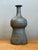 This vintage studio pottery vase is a refined example of mid-century ceramic craftsmanship, distinguished by its...