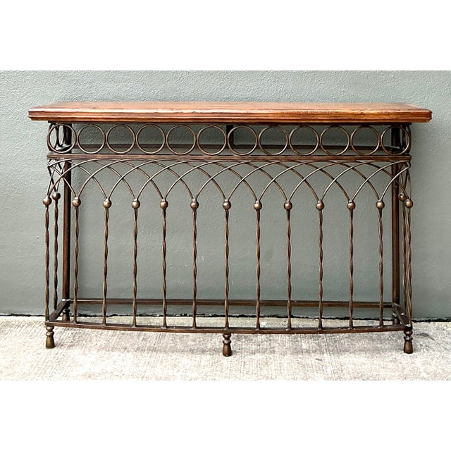 This striking console table seamlessly blends rustic charm with architectural elegance, drawing deep inspiration from...