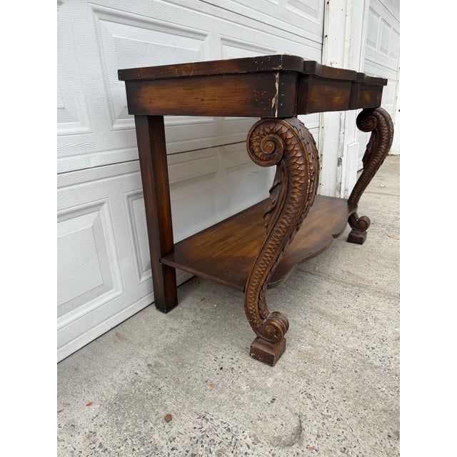 Late 20th Century Vintage Neoclassical Revival Console Table With Ornately Carved Scroll Supports and Lower Shelf For Sale - Image 5 of 12