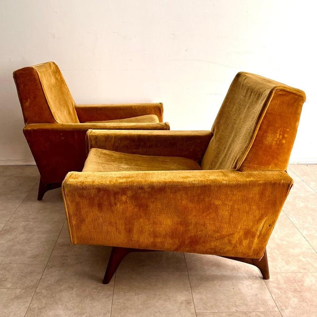 A splendid pair of Italian-made armchairs dating back to the mid-1950s, a perfect example of the Mid-Century Modern style....