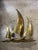 Mid 20th century, 1960s, Brass sculpture depicting 3 sailboats sailing across the water. Measures 20” tall , width and...