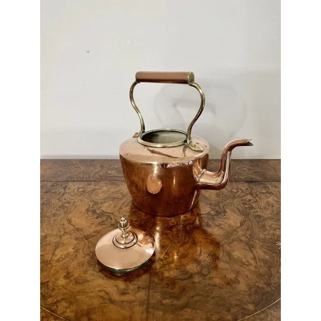 Antique George III quality copper kettle having a quality copper kettle with a removable lid with the original brass knob,...