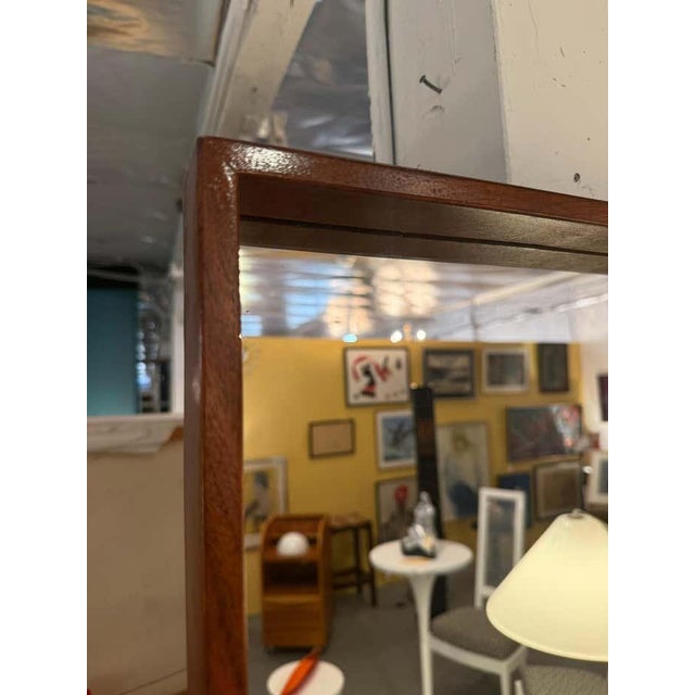 A refined example of Scandinavian craftsmanship, this rectangular walnut mirror by DUX embodies the timeless simplicity...