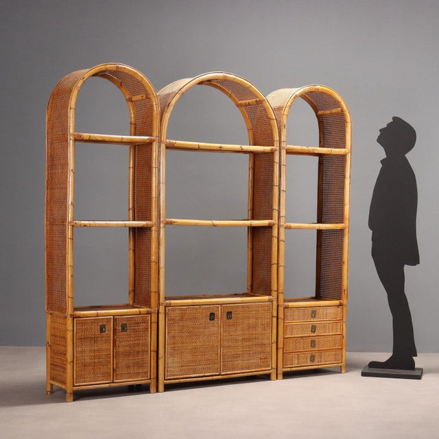 Vintage bookcase made of bamboo and wicker composed of three arched elements of equal height and depth but different...