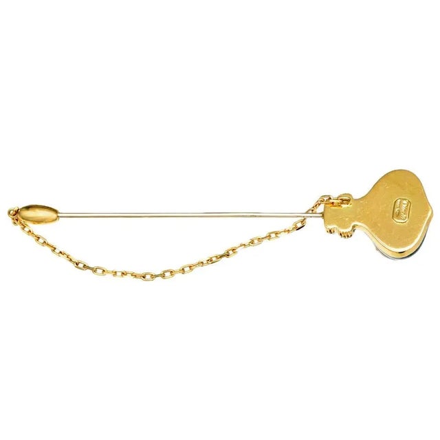Wear this beautifully colorful 18-karat yellow gold stick pin featuring an enamel balloon adorned with diamonds. This fun...