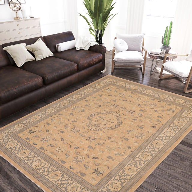 Enhance the ambiance of your home with this magnificent Persian-influenced Turkish hand-knotted rug made by skilled...