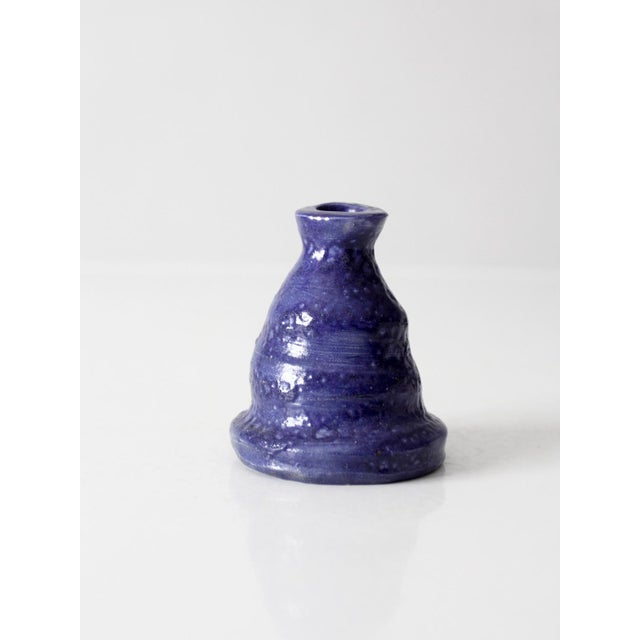 This vintage handmade studio pottery vase features an expressive bell-shaped form finished in a rich, saturated cobalt...