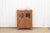 A handsome antique British colonial cabinet with timeless elegance. Constructed from high-quality teak wood, this early...