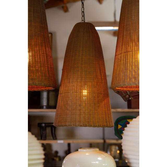 The Oasis Resin-Woven Lantern is a substantial decor piece designed to endure the shifting conditions of high-end...