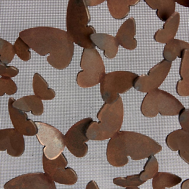 The butterfly fireplace screen combines movement, grace, and charm. Each butterfly is formed with individual, hand bent...