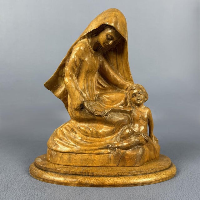 A fine hand-carved wooden sculpture, an authentic example of holy land craftsmanship dating back to the 1960s. subject and...