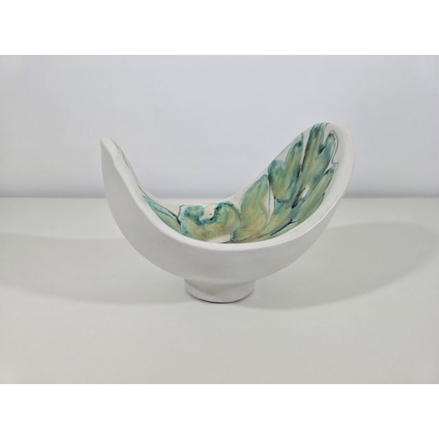 A rare decorative French ceramic bowl signed Robert Bonfil (or Bonnefille), made in the 1950s. This elegant piece features...