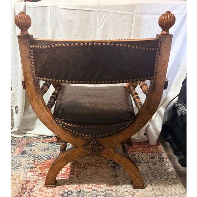 Beautiful vintage Renaissance style X framed Armchair. Made of solid wood with beautiful embossing and finals. Copper...