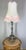 French Vintage Brass Lam This charming piece dates from the last half of the 19th Century The figure has a bright patina...