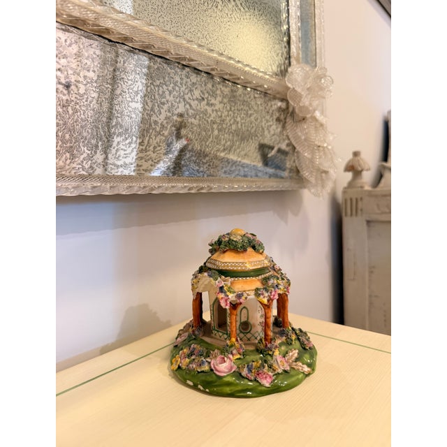 A delightful 19th century English Staffordshire pottery pastille burner modeled as an ornate garden pavilion. Richly...