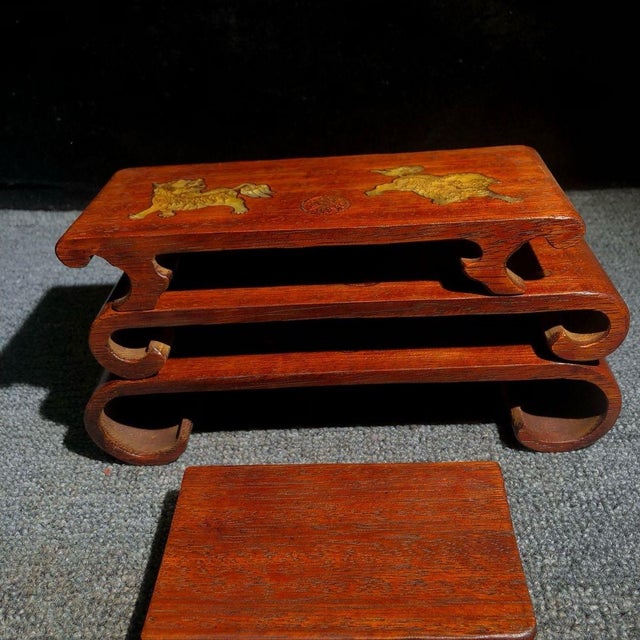 This is a matching set of four vintage display stands, crafted from rosewood (huali wood) and decorated with intricate...