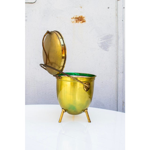 Ice bucket made of brass and gold-plated metal. Make: Macabo 1960s This piece has an attribution mark, I am sure that it...