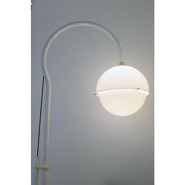 Floor lamp design Luigi Bandini Buti for Kartell 1965. Painted tubular metal structure, acrylic glass double hemisphere...