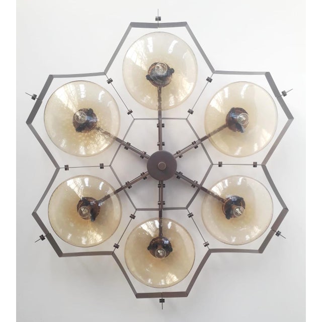 Italian midcentury flush mount with six amber Murano glass shades carefully hand blown with bubbles inside the glass using...