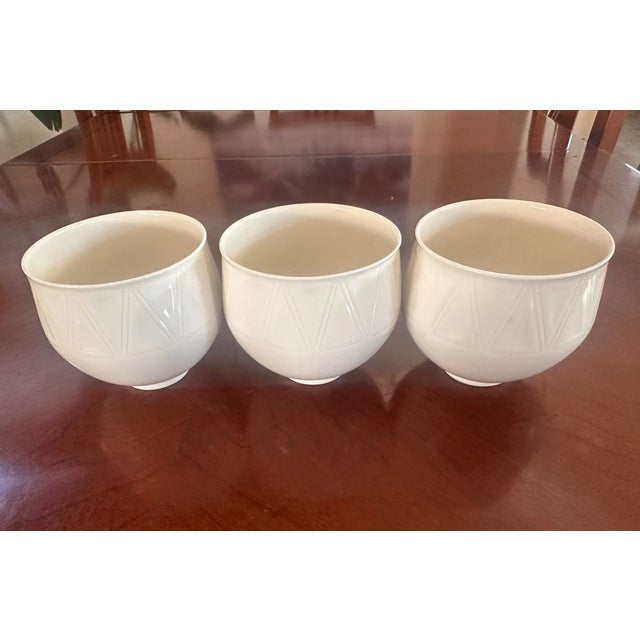 Elegant and timeless Royal Copenhagen White Fluted porcelain bowls, crafted in Denmark and celebrated for their clean...