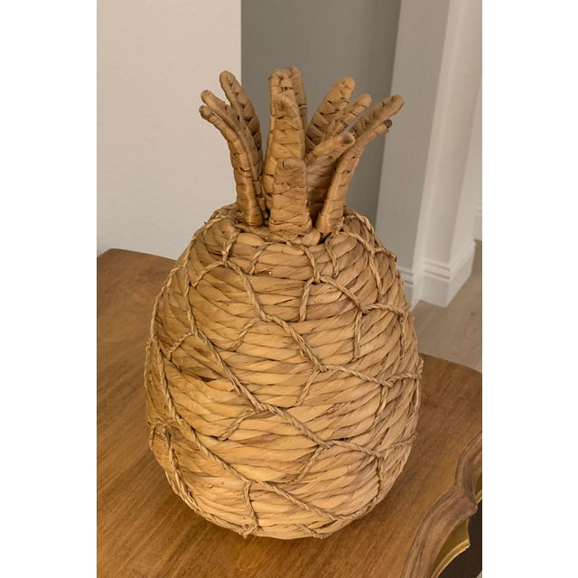 Woven pineapple made of sea grass with good size; color and condition - a fun tropical accent piece.