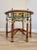 A magnificent handcrafted vintage oak wood framed glass top haberfeld table with substantial gilded bronze and pierced...
