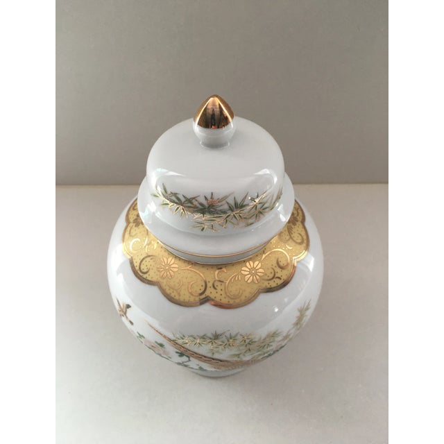 Nice hand painted porcelain vase made in Japan.