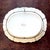 An impressive large English earthenware platter featuring the “Antiquarian” pattern, attributed to Thomas Fell & Co., St....