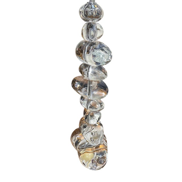 Beautiful, clear crystal lamp by George Kovacs. The chic, modern design looks like a stack of smooth stones. The central...