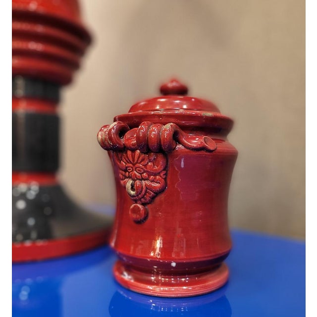 Exquisite vase made of contemporary ceramics color blood of bull. This piece emanates a clear oriental influence, palpable...