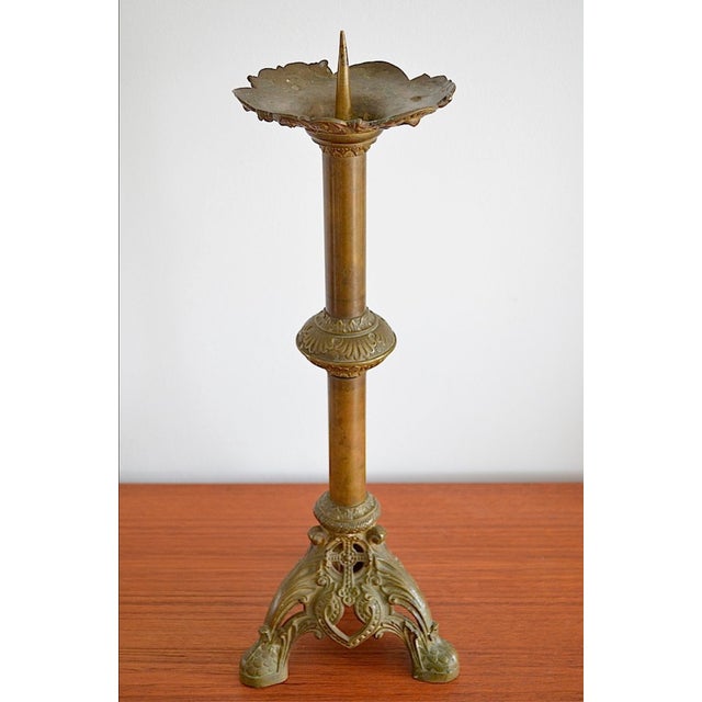 Antique candlestick/altar candlestick from around 1880. The candlestick is a stately 52 cm tall and made of brass. The...