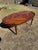 This elegant Louis XVI-style oval dining table showcases refined neoclassical design and exceptional craftsmanship. The...