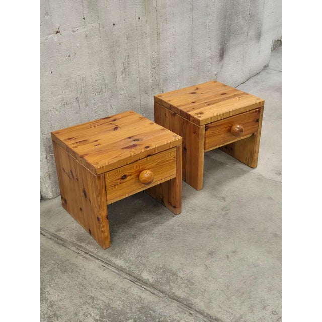 A pair of solid pine bedside tables, Swedish brutalism / Midcentury 1970s. Nice patina, naturally darkened wood. Normal...