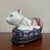 Beautiful vintage famille rose ceramic cat sculpture in wooden base.
